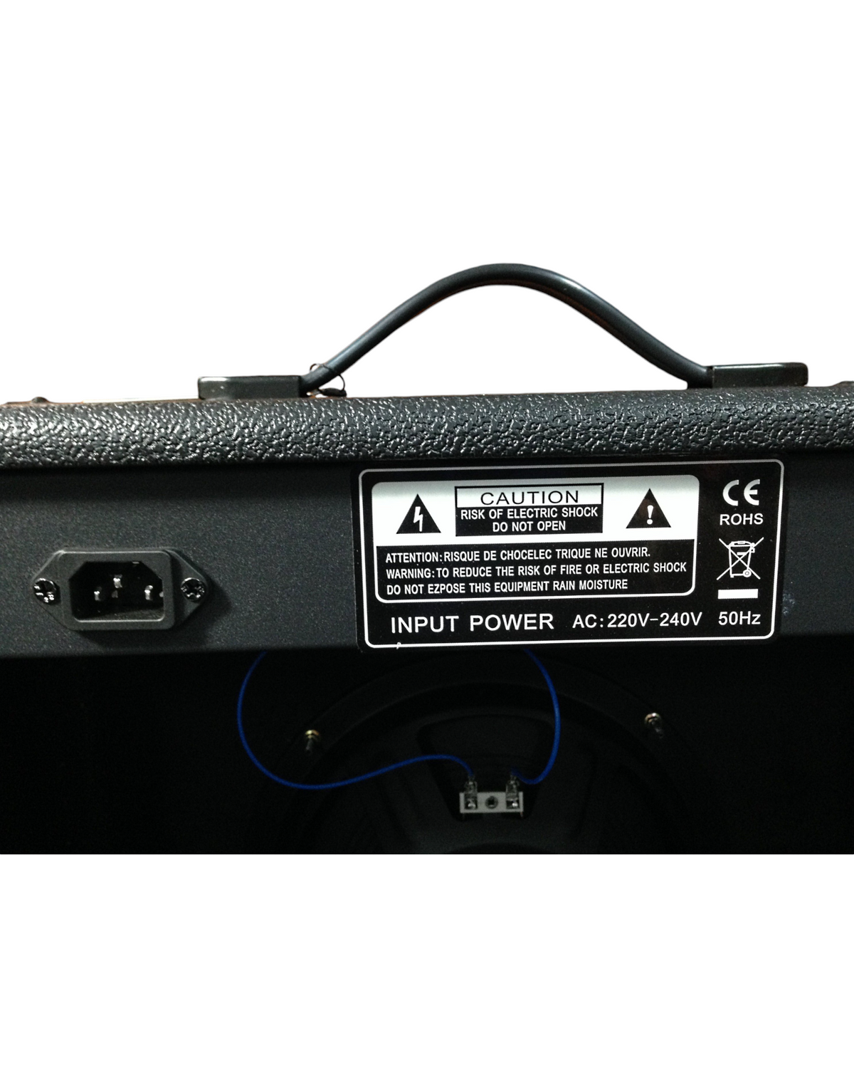 Rear panel of Haze Guitar Australia HSB60 bass amplifier showing power input and safety warning label