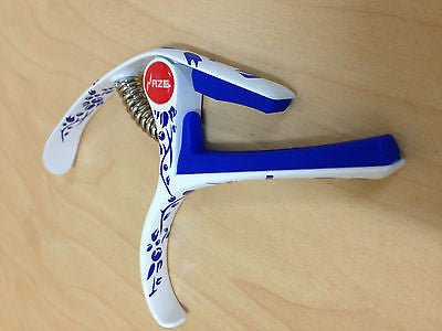 Haze DC06C Ceramic Design Guitar Capo + 3 Picks